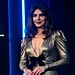 Priyanka Chopra's Gold Metallic Plunging Dress With a Bow