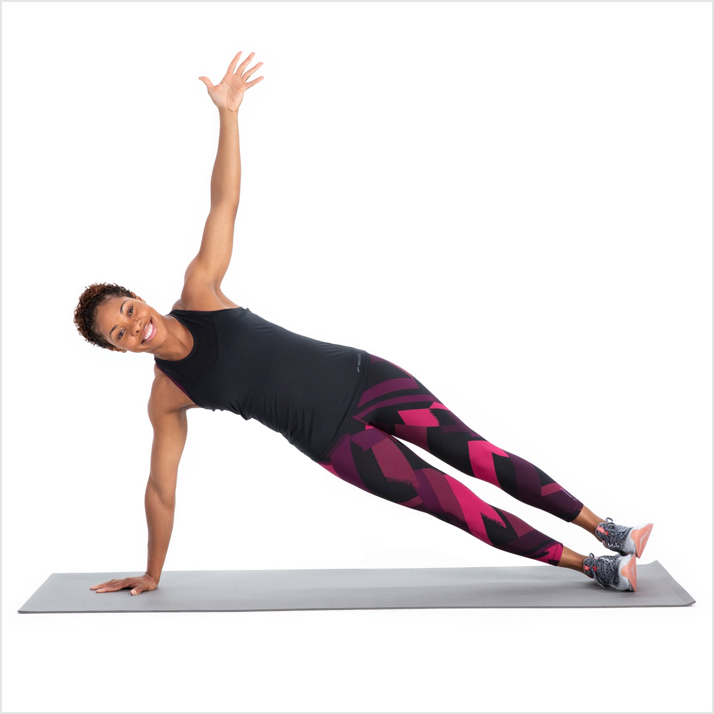 Sporty black man and woman training yoga in side plank pose outdoors Stock  Photo by Prostock-studio