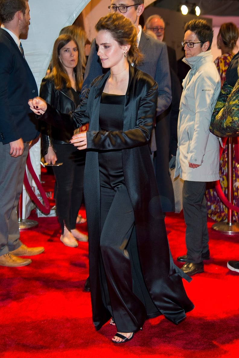 She Then Switched Into a Black Jumpsuit and Long Silk Duster