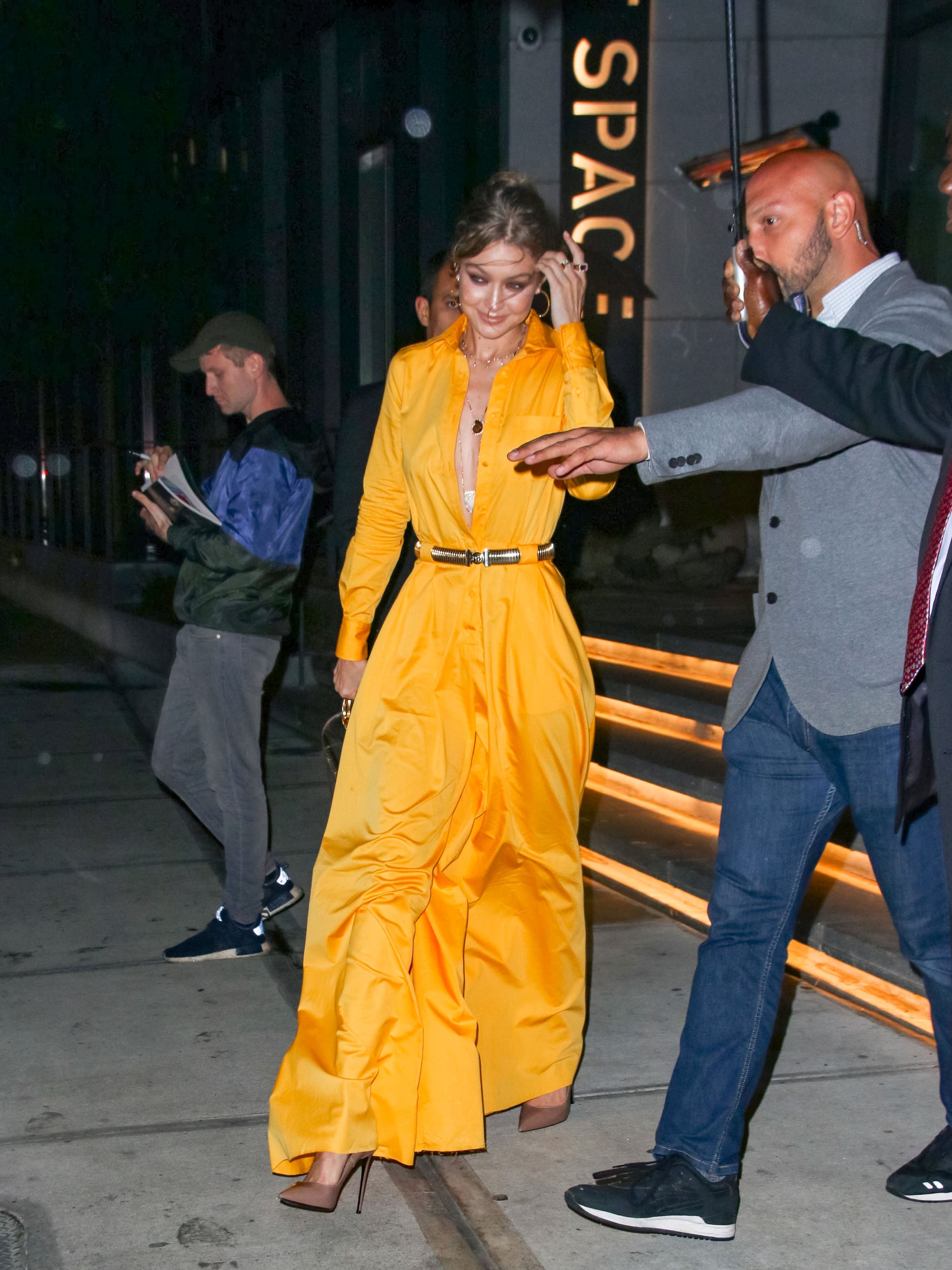 Gigi Hadid is living the accessories dream carrying a full bottle of rosé  around in a clear purse