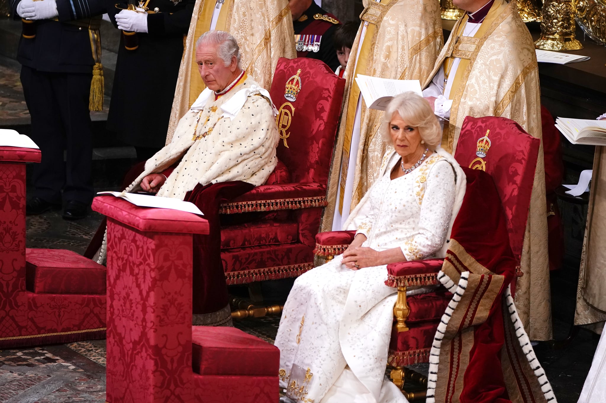 LONDON, ENGLAND - MAY 06: King Charles III and Queen Camilla attend their Coronation at Westminster Abbey on May 6, 2023 in London, England. The Coronation of Charles III and his wife, Camilla, as King and Queen of the United Kingdom of Great Britain and Northern Ireland, and the other Commonwealth realms takes place at Westminster Abbey today. Charles acceded to the throne on 8 September 2022, upon the death of his mother, Elizabeth II. (Photo by Yui Mok - WPA Pool/Getty Images)