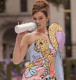 Gigi Hadid Lives Out the Most “Mom” Runway Moment Ever, and It Involves a Baby Bottle