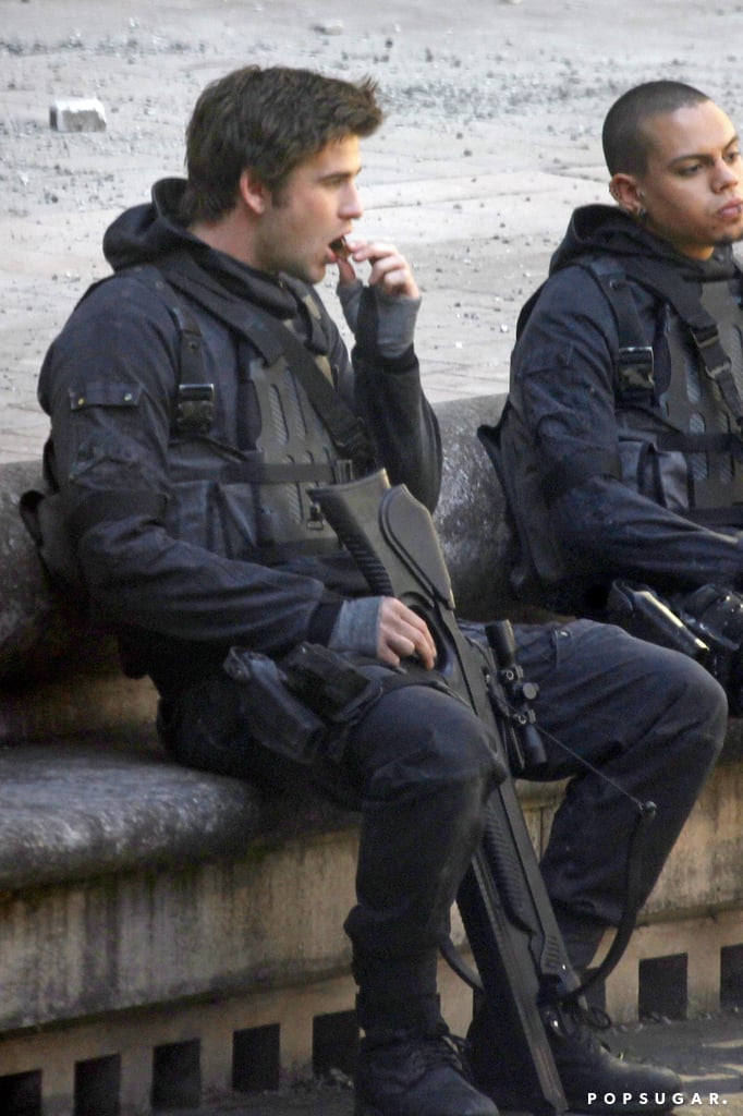 Liam Hemsworth Eating Chocolate on the Mockingjay Set