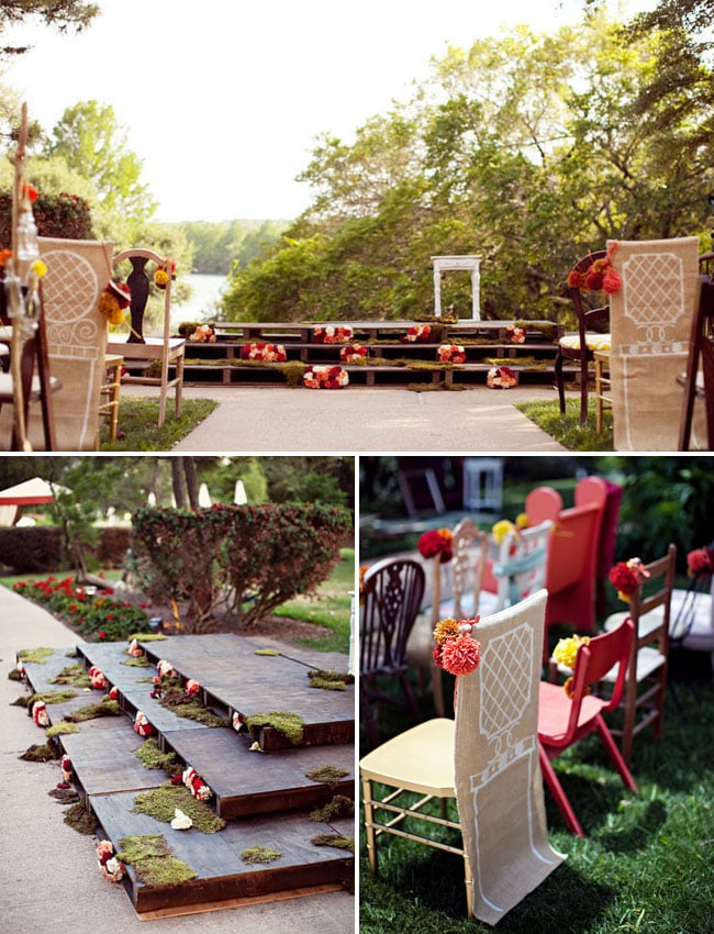 For an Anthropologie-esque setup, try stacking pallets on top of each other to create a mini wooden stage. Then slip in some flower arrangements to brighten the look.
Photo by EE Photography via Green Wedding Shoes