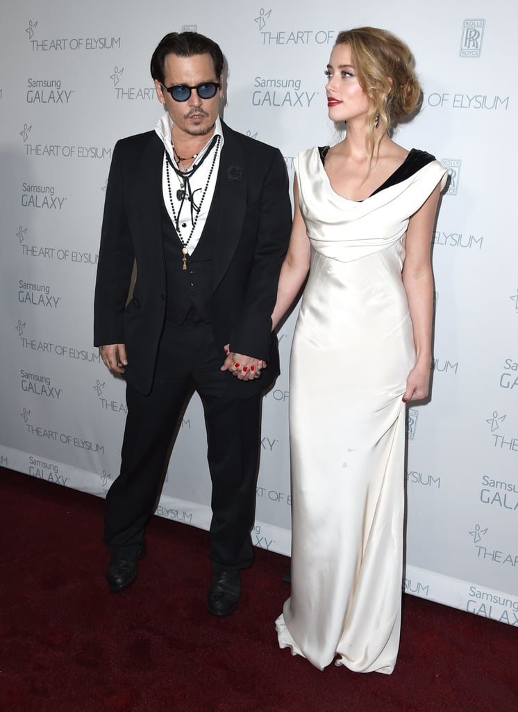 Johnny Depp and Amber Heard at the Art of Elysium Gala 2015