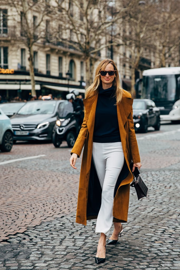 Your simple turtleneck will go a long way when paired with a long trench.
