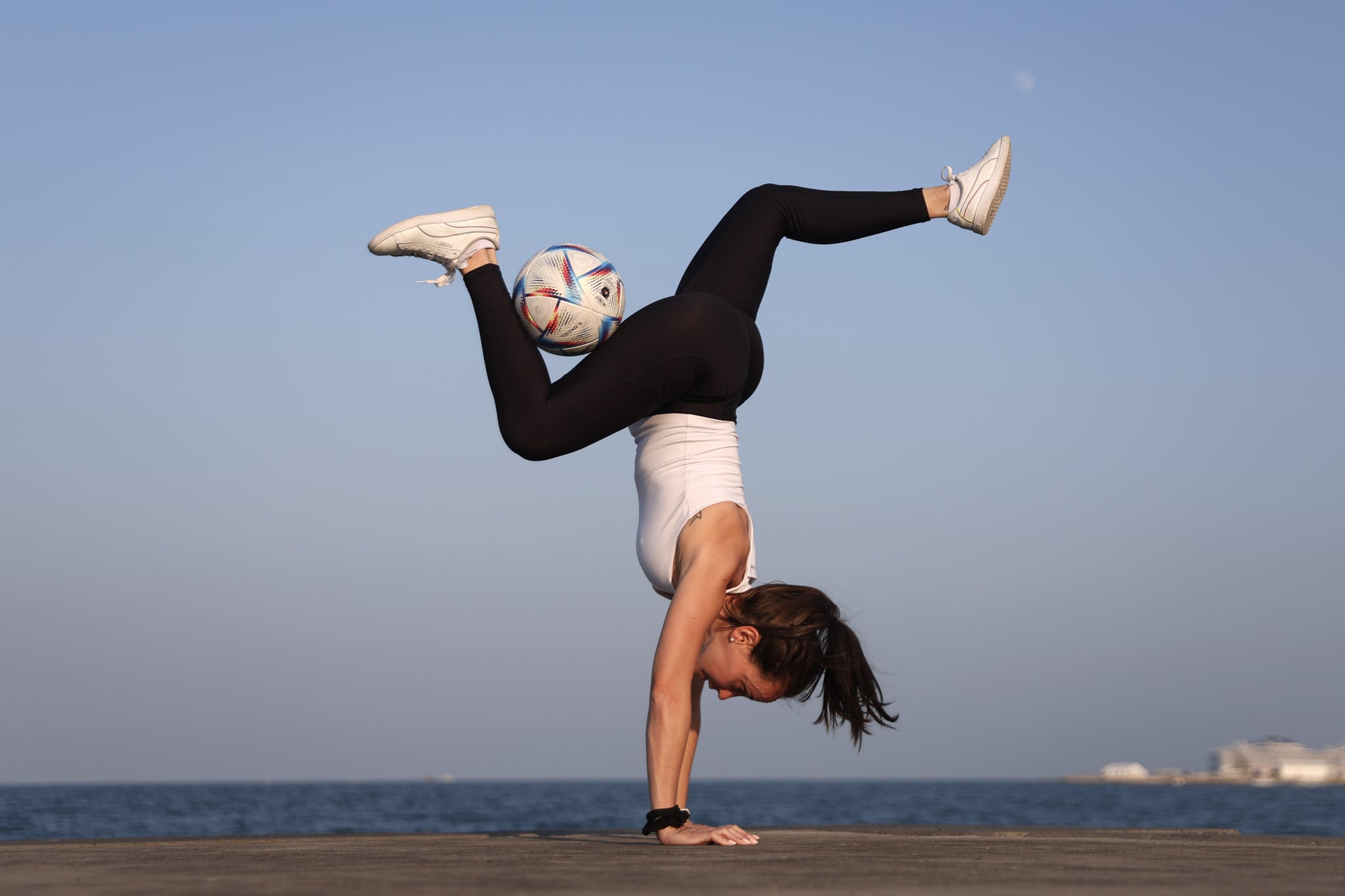 Football freestyler Laura Biondo performs on the corniche during the FIFA World Cup Qatar 2022,