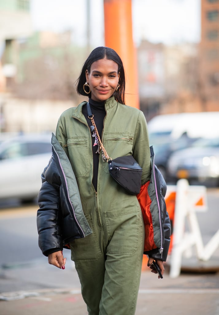 Styling a belt bag crossbody over a boiler suit is a fashion-forward take on functional.