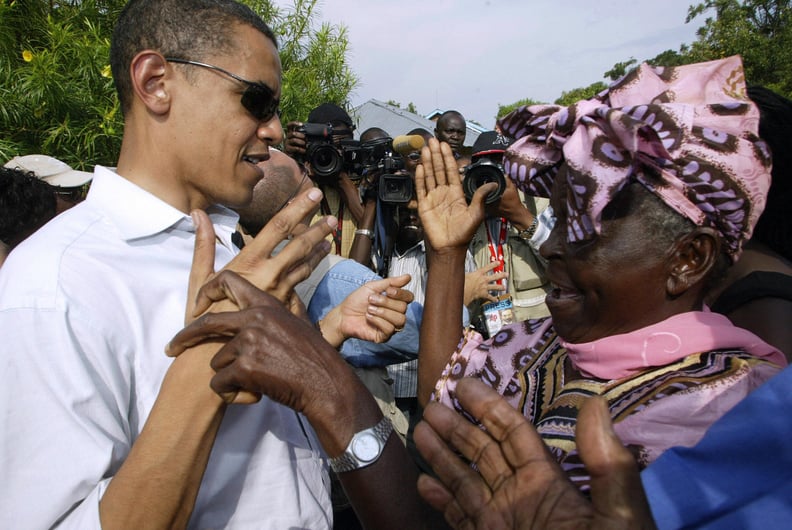 Embracing his grandmother during a visit to Kenya as senator in 2006