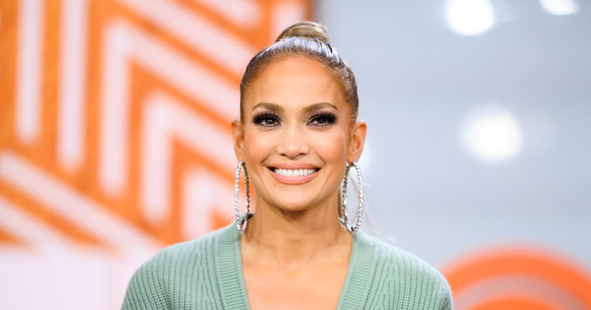 J Lo Wears a Plunging Sweater Dress With a Thigh-High Slit on Instagram Live.jpg