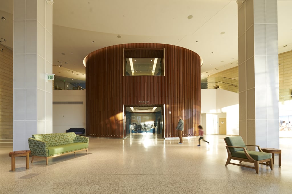 The elevator in the lobby was designed to resemble a redwood tree, and features locally-sourced reclaimed wood from nearby Moffett Field Hangar.