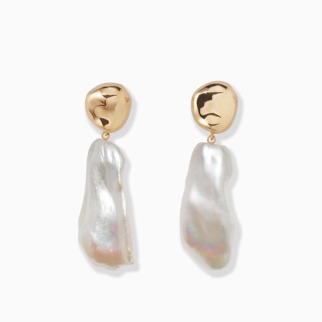 "I love how the pearl trend is evolving into natural, baroque pearls and these Agmes Baroque Patrice Earrings ($450) are my perfect statement pair for Summer occasions." — LL