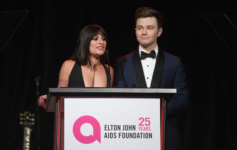 LOS ANGELES, CA - MARCH 04:  Lea Michele (L) and Chris Colfer speak onstage during Elton John AIDS Foundation 26th Annual Academy Awards Viewing Party at The City of West Hollywood Park on March 4, 2018 in Los Angeles, California.  (Photo by Venturelli/Ge