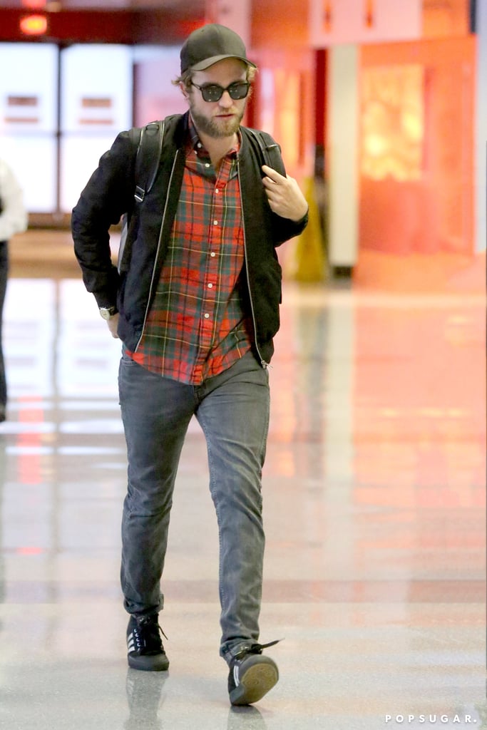 Robert Pattinson sported his beard when he touched down at LAX on Friday.