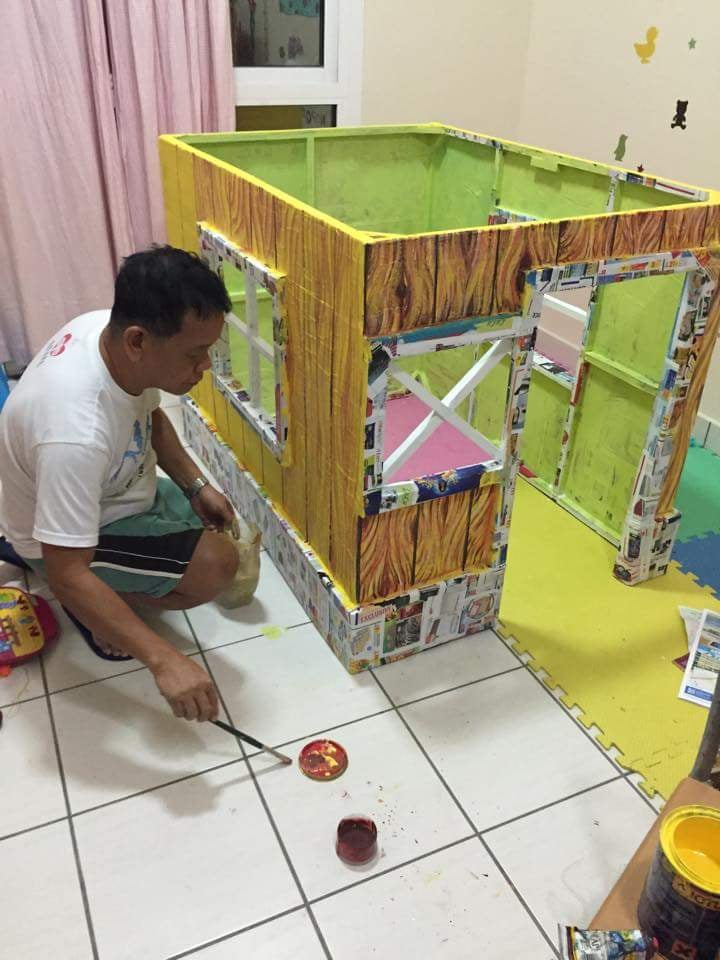 Grandfather Makes Cardboard Playhouse From Cardboard Boxes