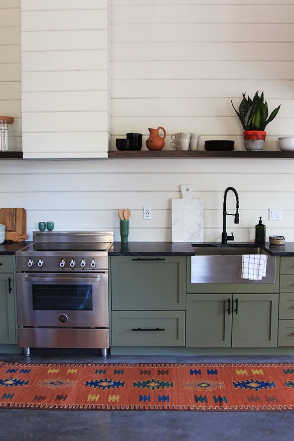 Decorist Design Director Jessica McCarthy said, "I love a simple shaker-style cabinet paired with an unexpected saturated color and unique hardware. A couple examples would be painting your cabinets a lacquered navy with modern brass hardware or going for a deep matte green with black hardware. The juxtaposition of classic and trendy is unpredictable and eye-catching."