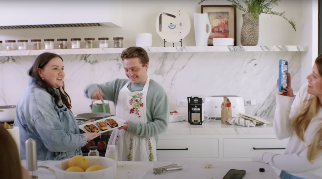 Here's a peek at her chic Smeg toaster and other kitchen art above the stove and countertops.