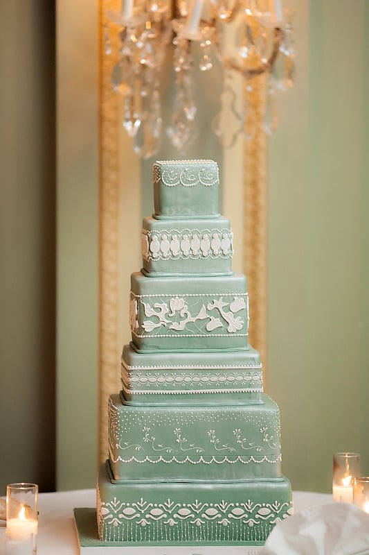 Six tiers are just enough to capture all the gorgeous details of this cake — the color stands out for good reason, and the lace-like icing is a delicate, classic touch. 
Photo by The Youngrens via Style Me Pretty