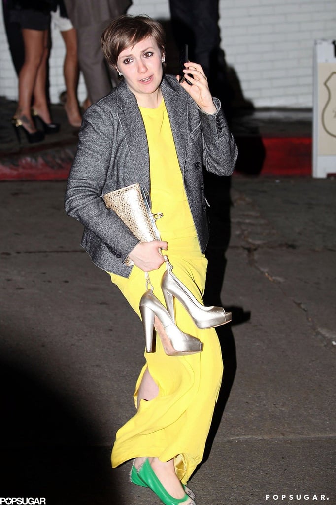 Lena Dunham took off her heels outside a Grammys afterparty in Hollywood.
Lena Dunham took off her heels outside a Grammys afterparty in Hollywood.