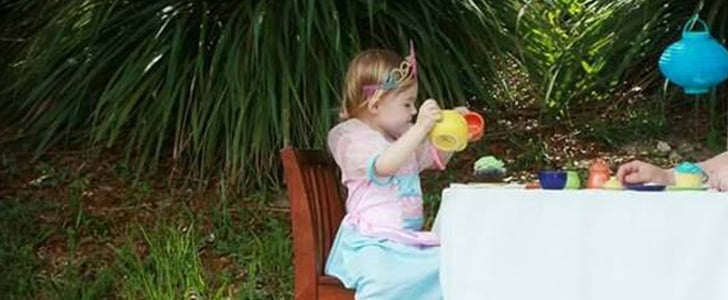 Photo of Police Officer Having Tea Party With Daughter