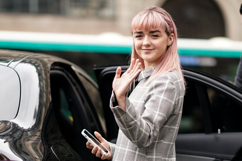 PARIS, FRANCE - MARCH 04: Maisie Williams wears a gray checked dress, outside Stella McCartney, during Paris Fashion Week Womenswear Fall/Winter 2019/2020, on March 04, 2019 in Paris, France. (Photo by Edward Berthelot/Getty Images)