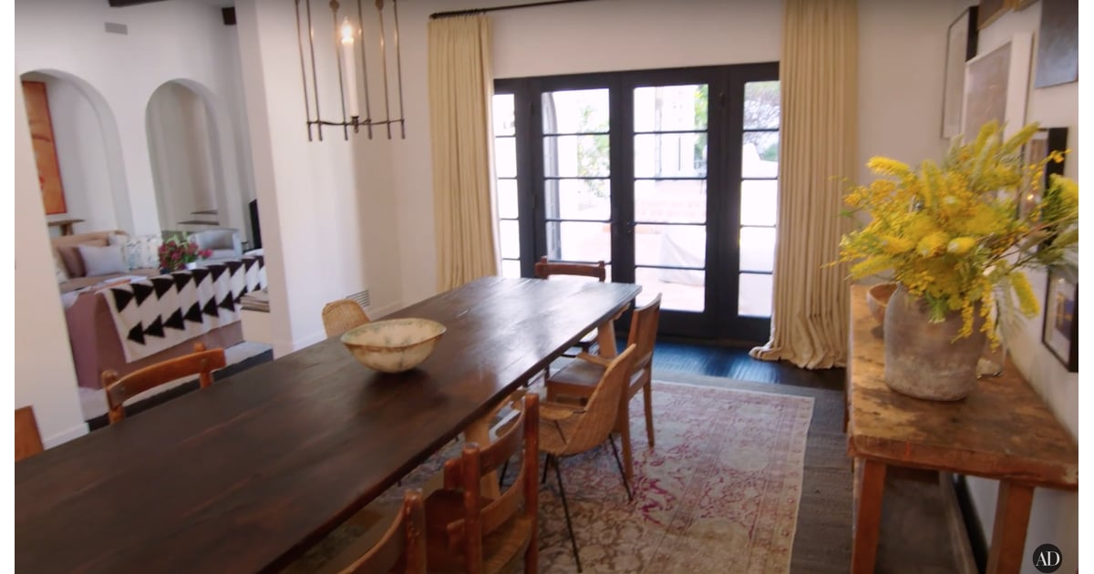 The dining-room table has delightfully mismatched wooden ...