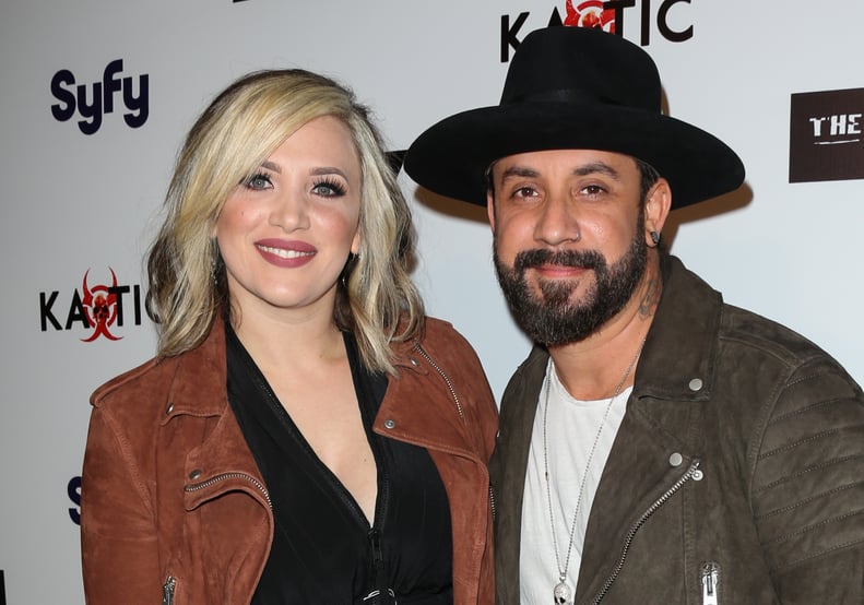 LOS ANGELES, CALIFORNIA - APRIL 01:  Singer AJ McLean (R) and his Wife Rochelle Deanna Karidis (L) attend the premiere of Syfy's 