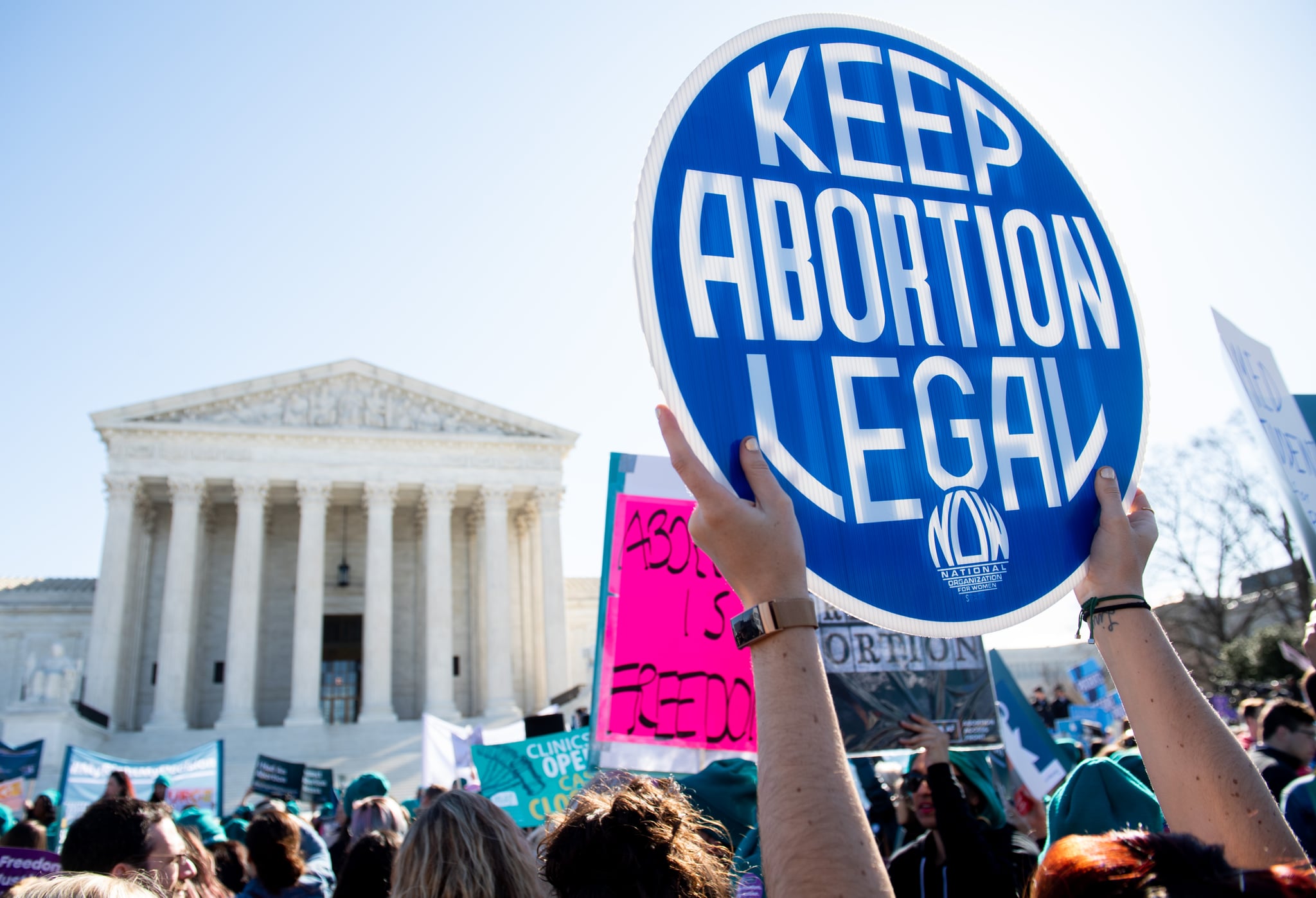 Pro-choice activists supporting legal access to abortion protest during a demonstration outside the US Supreme Court in Washington, DC, March 4, 2020, as the Court hears oral arguments regarding a Louisiana law about abortion access in the first major abortion case in years. - The United States Supreme Court on Wednesday will hear what may be its most significant case in decades on the controversial subject of abortion. At issue is a state law in Louisiana which requires doctors who perform abortions to have admitting privileges at a nearby hospital. (Photo by SAUL LOEB / AFP) (Photo by SAUL LOEB/AFP via Getty Images)