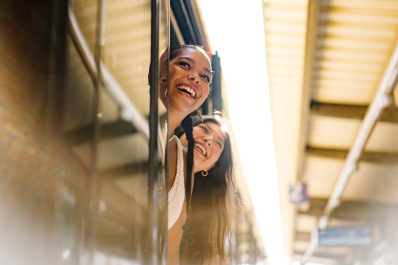 two friends traveling on a train