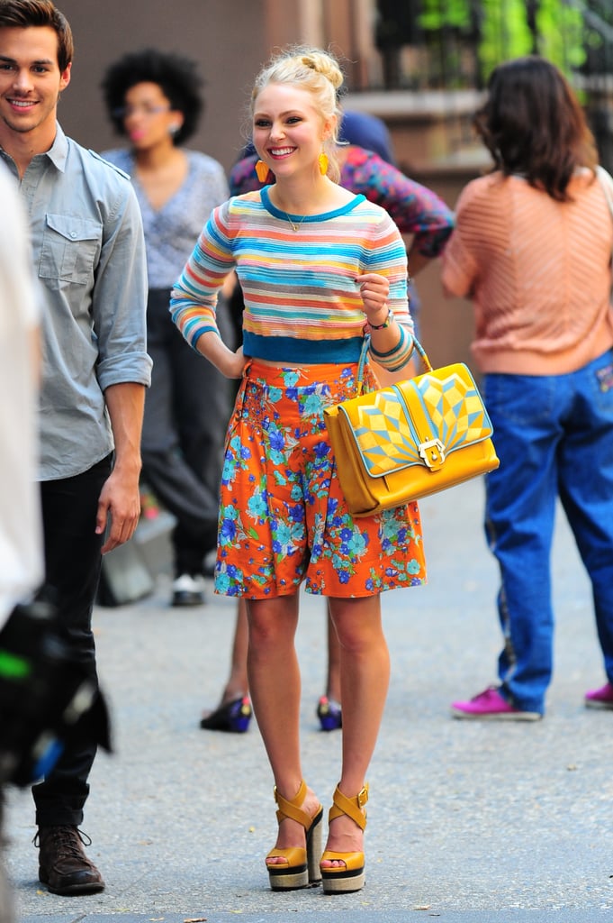Carrie knows the key to mixing prints is finding a coordinating base color. She sported a colorful cropped sweater with high-waist floral shorts, then accessorized with a gorgeous Paula Cademartori bag. Take Carrie's bold ensemble from the streets to the beach with these tropical Josh Goot shorts ($940).