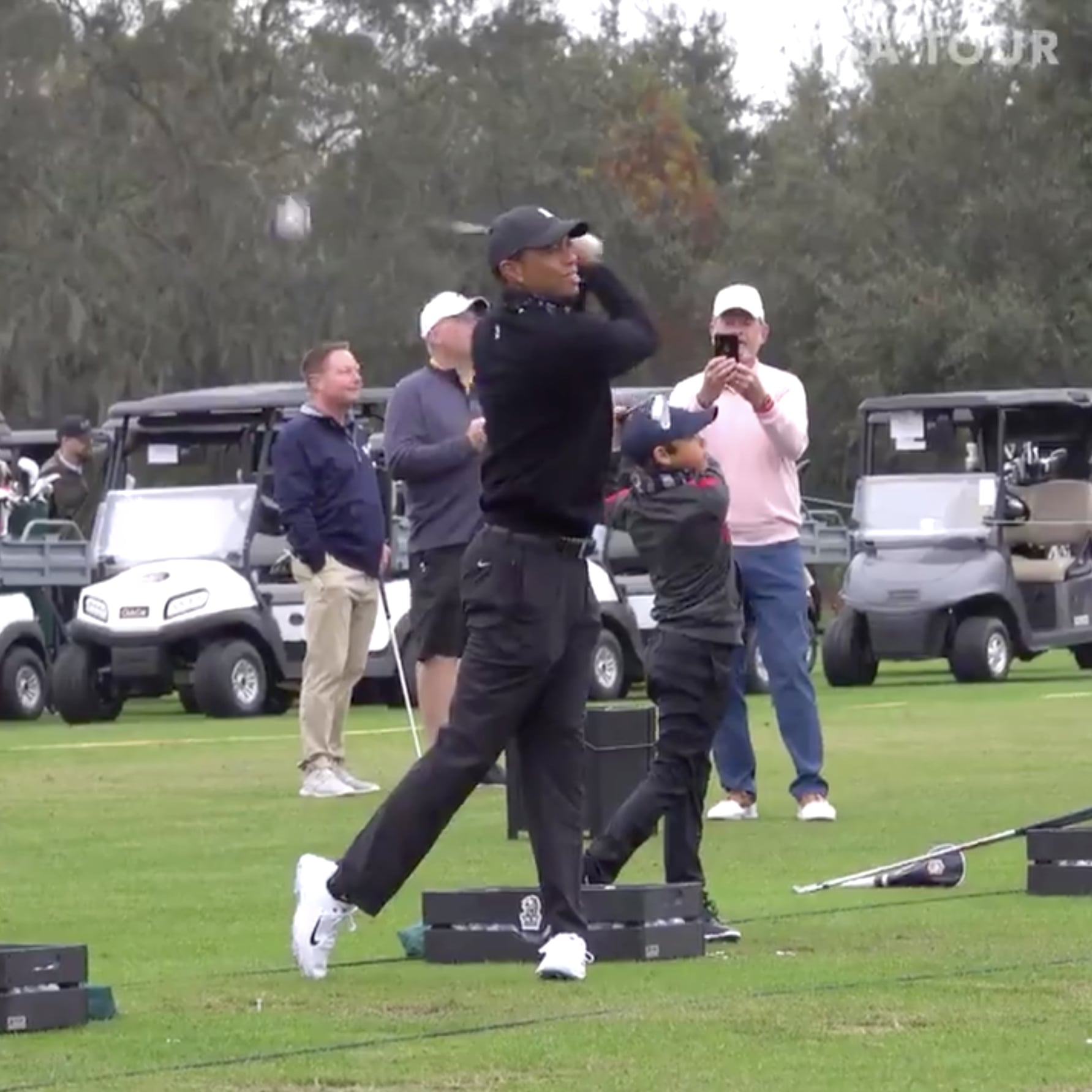 Watch Tiger Woods And Son Charlie Play Golf Together Popsugar Family