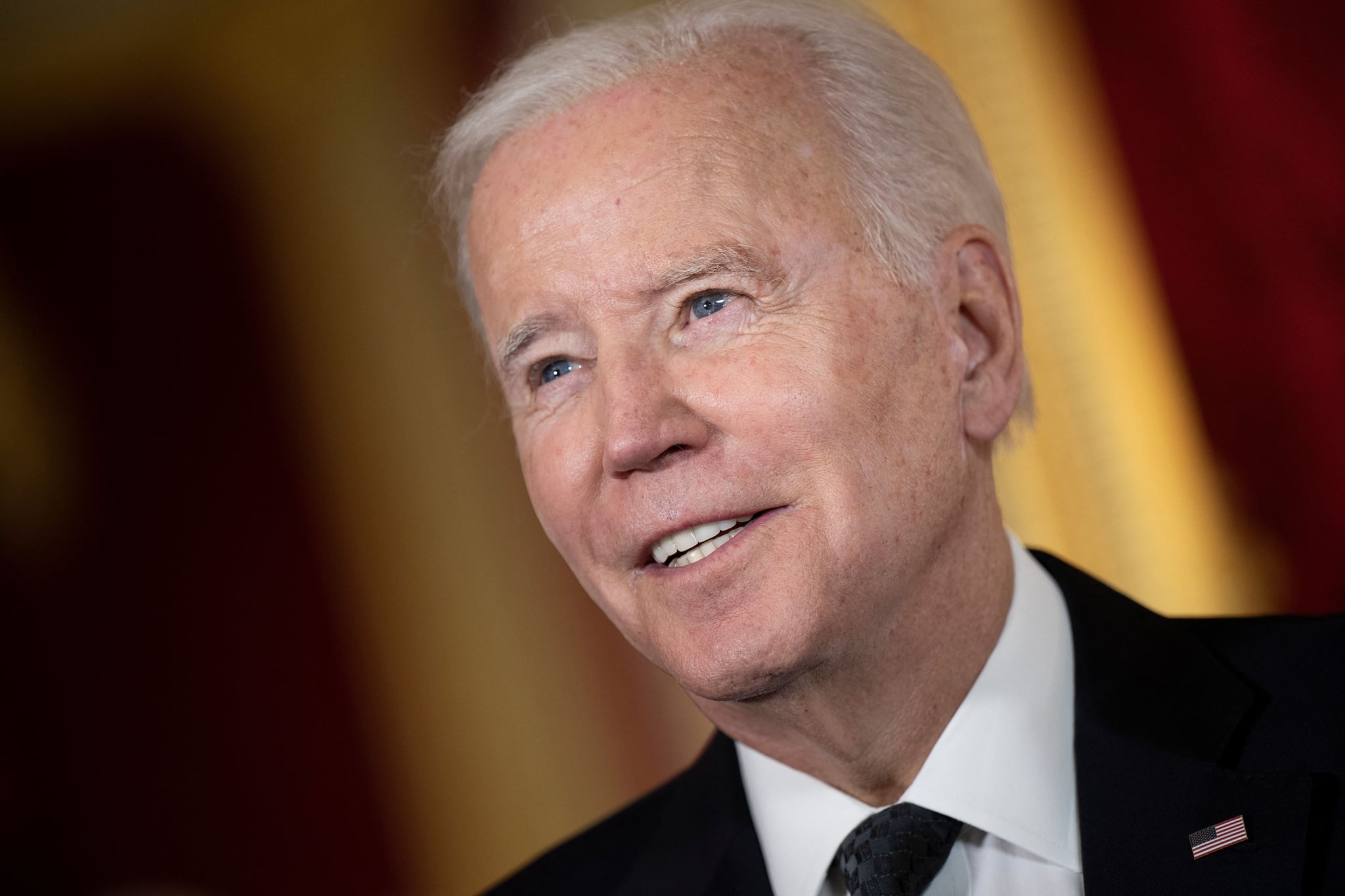 US President Joe Biden speaks after signing a book of condolence at Lancaster House in London on September 18, 2022, following the death of Queen Elizabeth II on September 8. - Britain was gearing up Sunday for the momentous state funeral of Queen Elizabeth II as King Charles III prepared to host world leaders and as mourners queued for the final 24 hours left to view her coffin, lying in state in Westminster Hall at the Palace of Westminster. (Photo by Brendan Smialowski / AFP) (Photo by BRENDAN SMIALOWSKI/AFP via Getty Images)