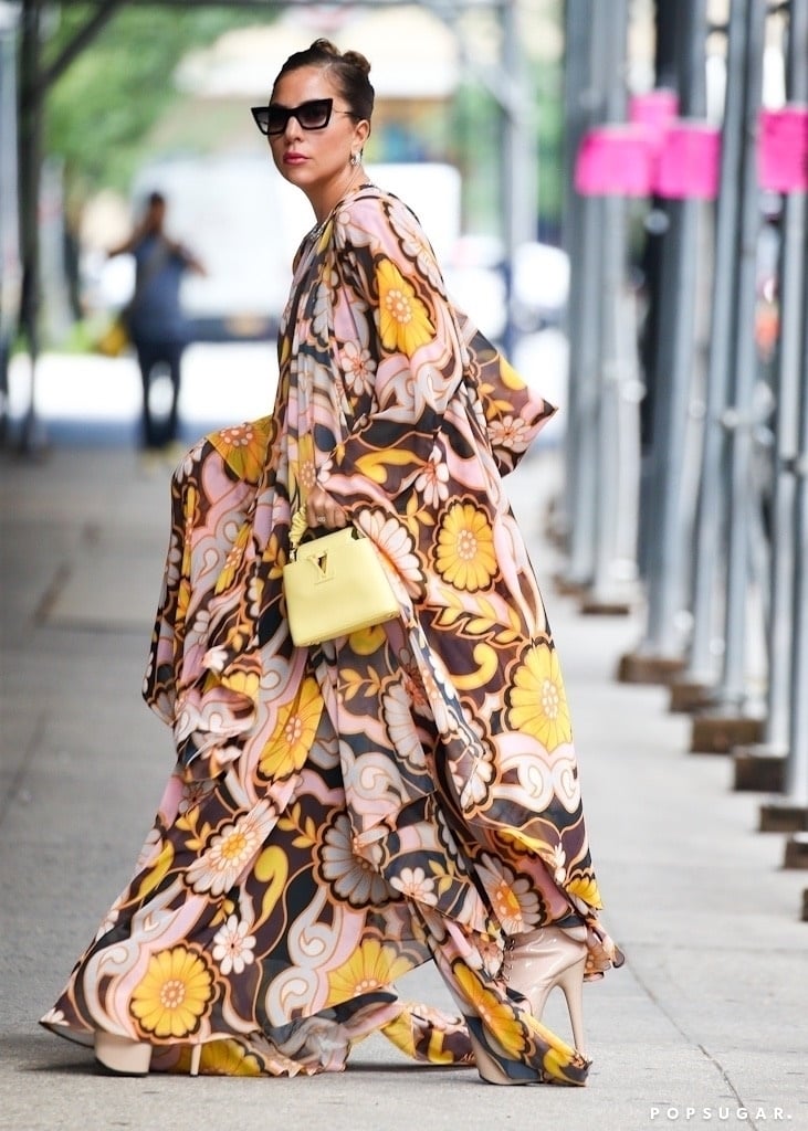 She almost fully concealed her beige booties with this floor-length Richard Quinn gown, but alas, they peeked through to say, "Hi, yep, we're back!"