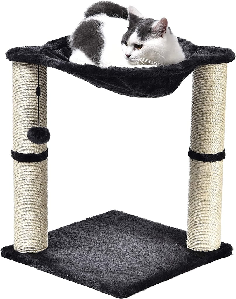 Amazon Basics Cat Tower with Hammock ($30)
Even if you have a small apartment, you can still create a designated space for your pet with this small cat tree from Amazon. The compact model features two scratching posts and a plush hammock that your cat will love curling up in at the end of a long day. Plus, thanks to its shorter frame, it's a great space-saving option that's easy to squeeze underneath a desk or into an unused corner of your home.