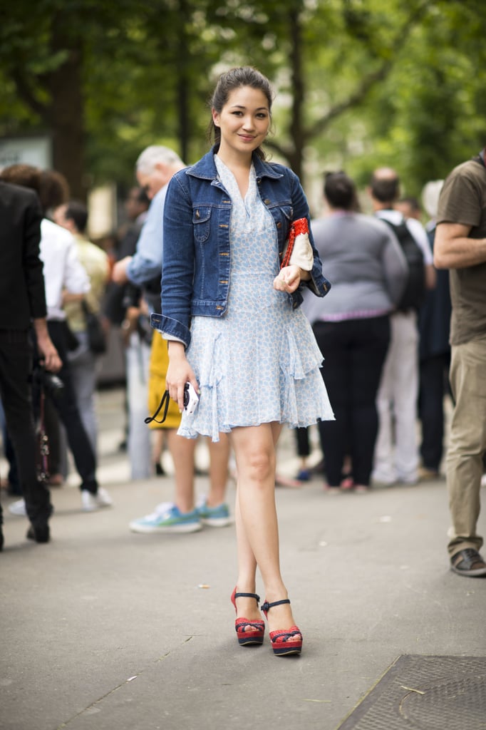 A diaphanous dress gets a dose of classic Americana with her staple denim jacket.
A diaphanous dress gets a dose of classic Americana with her staple denim jacket.
