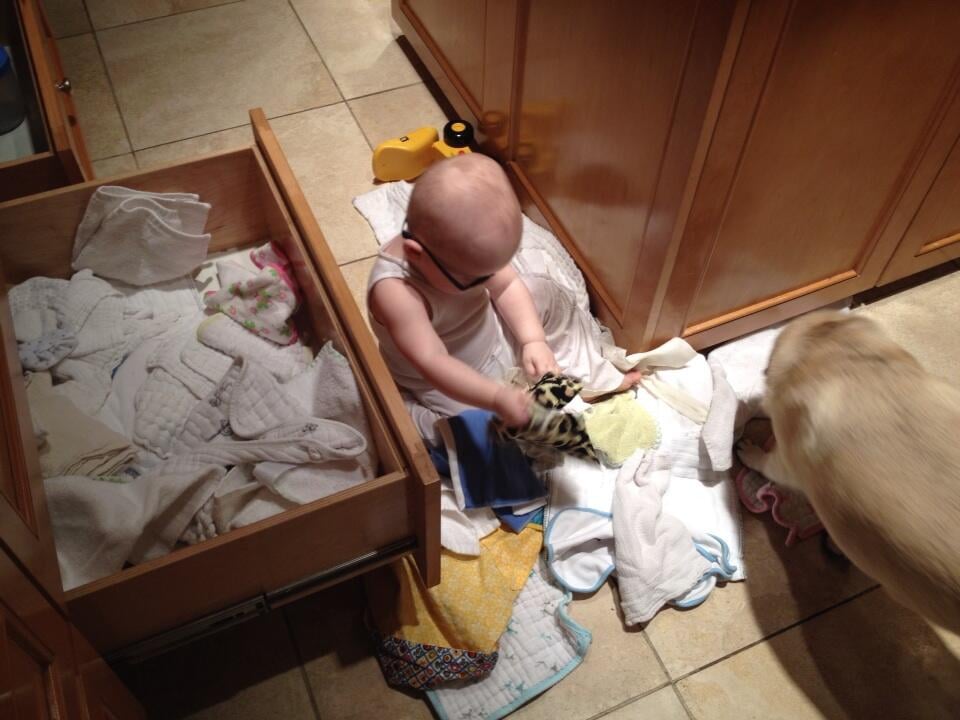 Anna: "I was going to hire someone to help me organize but turns out my baby and dog are great at it!"