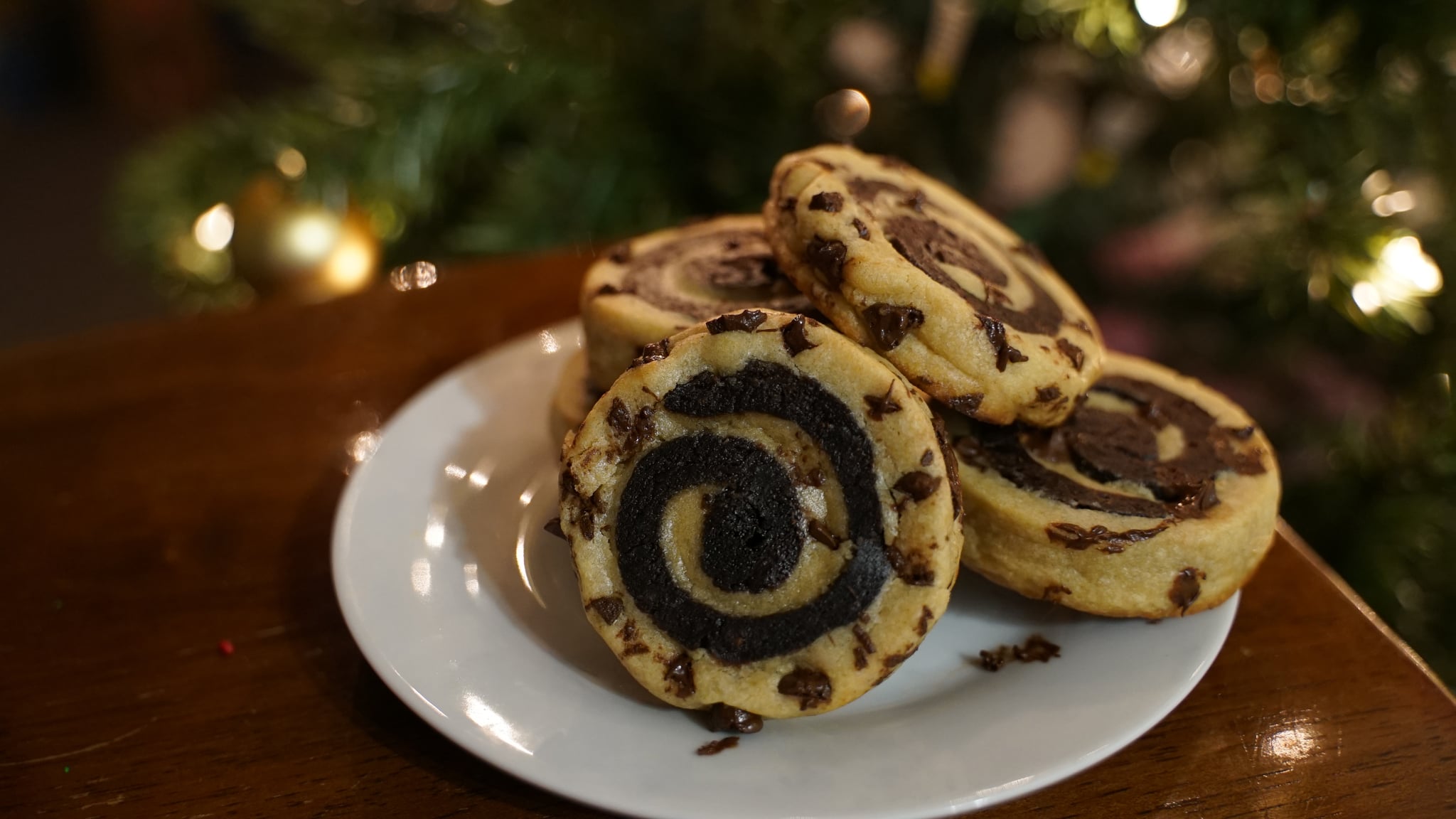 Plate of chocolate chip cookie and brown pinwheels