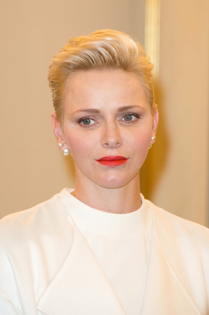 She Wore White Pearl Earrings and a Bold Red Lip