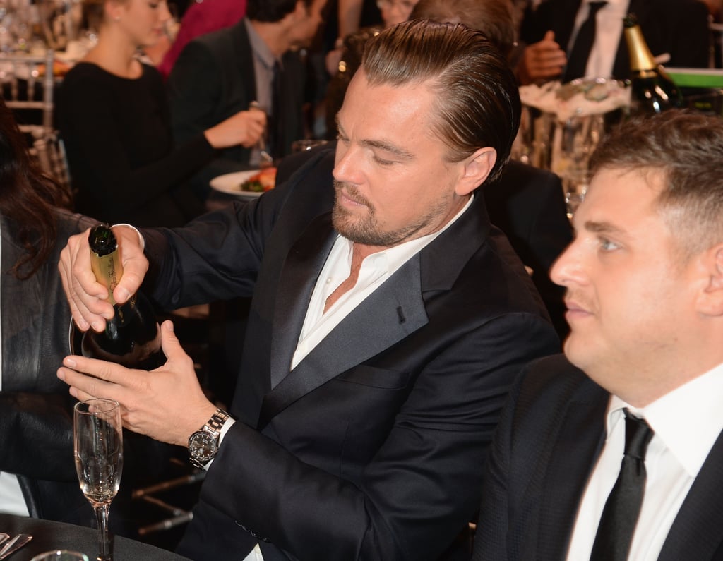 Leonardo DiCaprio poured himself some Champagne.