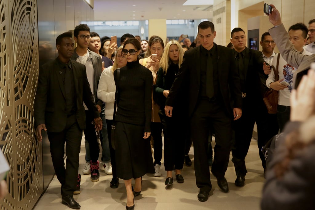Victoria Beckham Black Turtleneck in Hong Kong March 2016