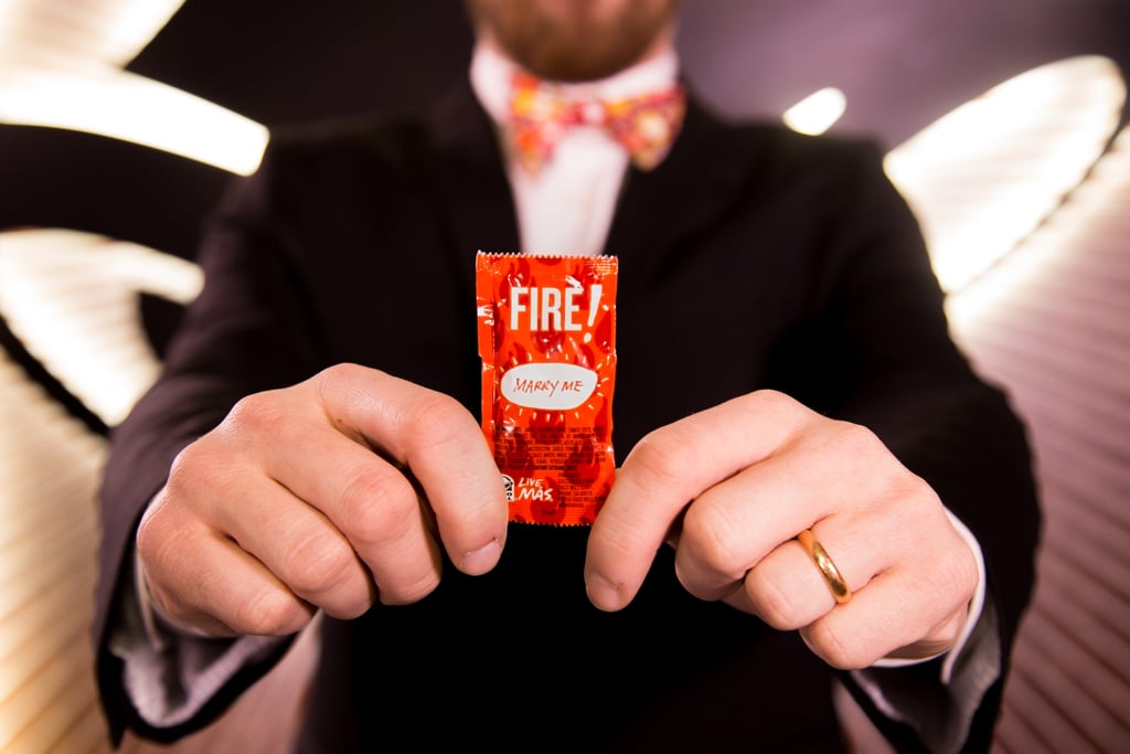 The wedding's hot sauce packets will read, "Marry me." The wedding's hot sauce packets will read, "Marry me."