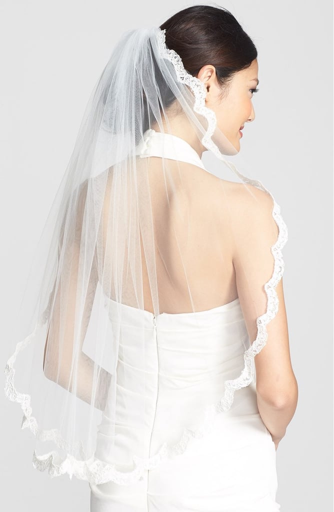For brides who love lace, this little detail on the veil's boarder ($528) is perfection.
For brides who love lace, this little detail on the veil's boarder ($528) is perfection.