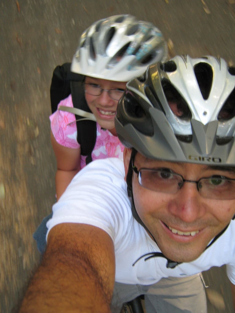 To the dad biking to school with his child.