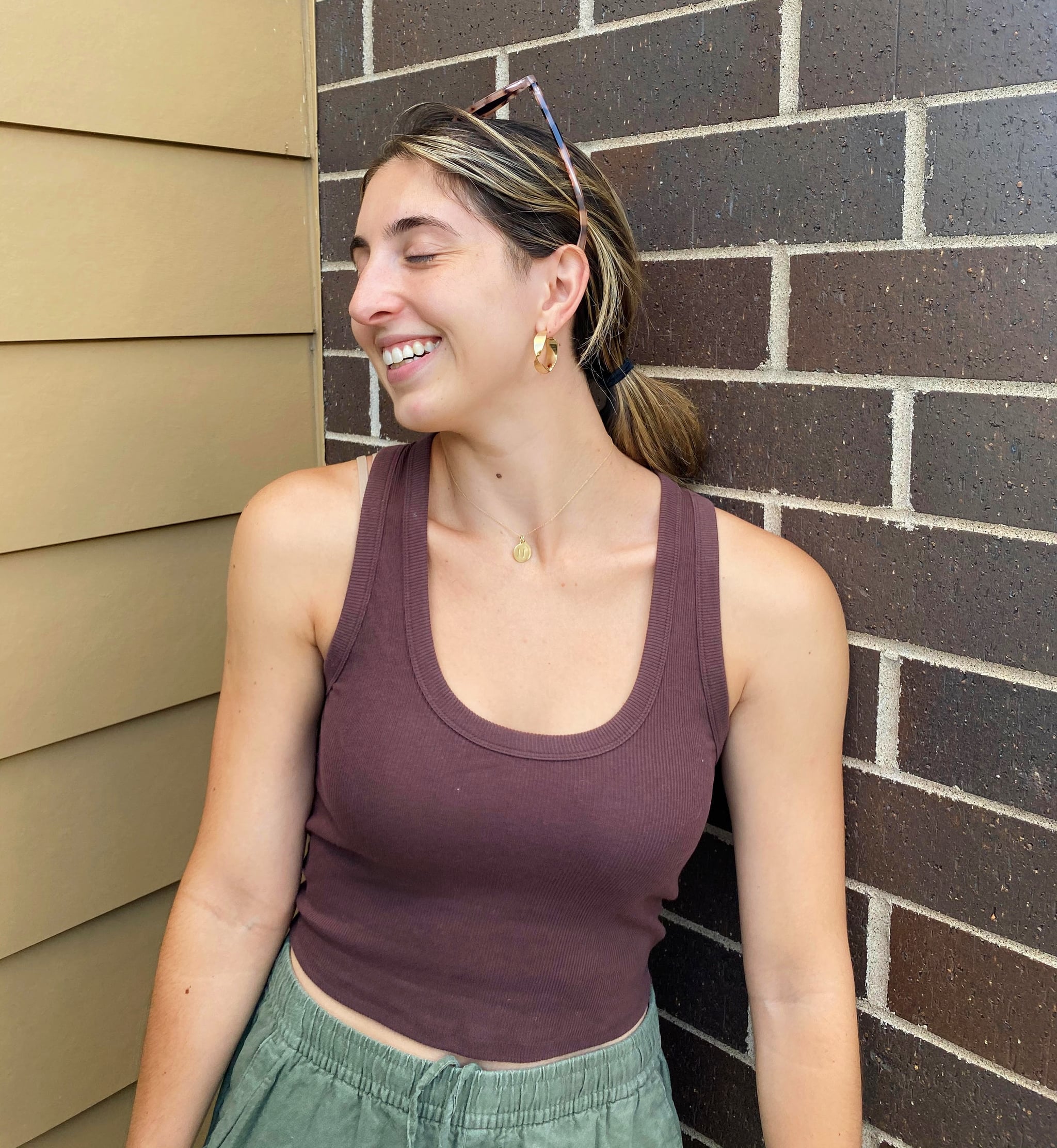 woman in brown high-waisted tank top and brown fitch