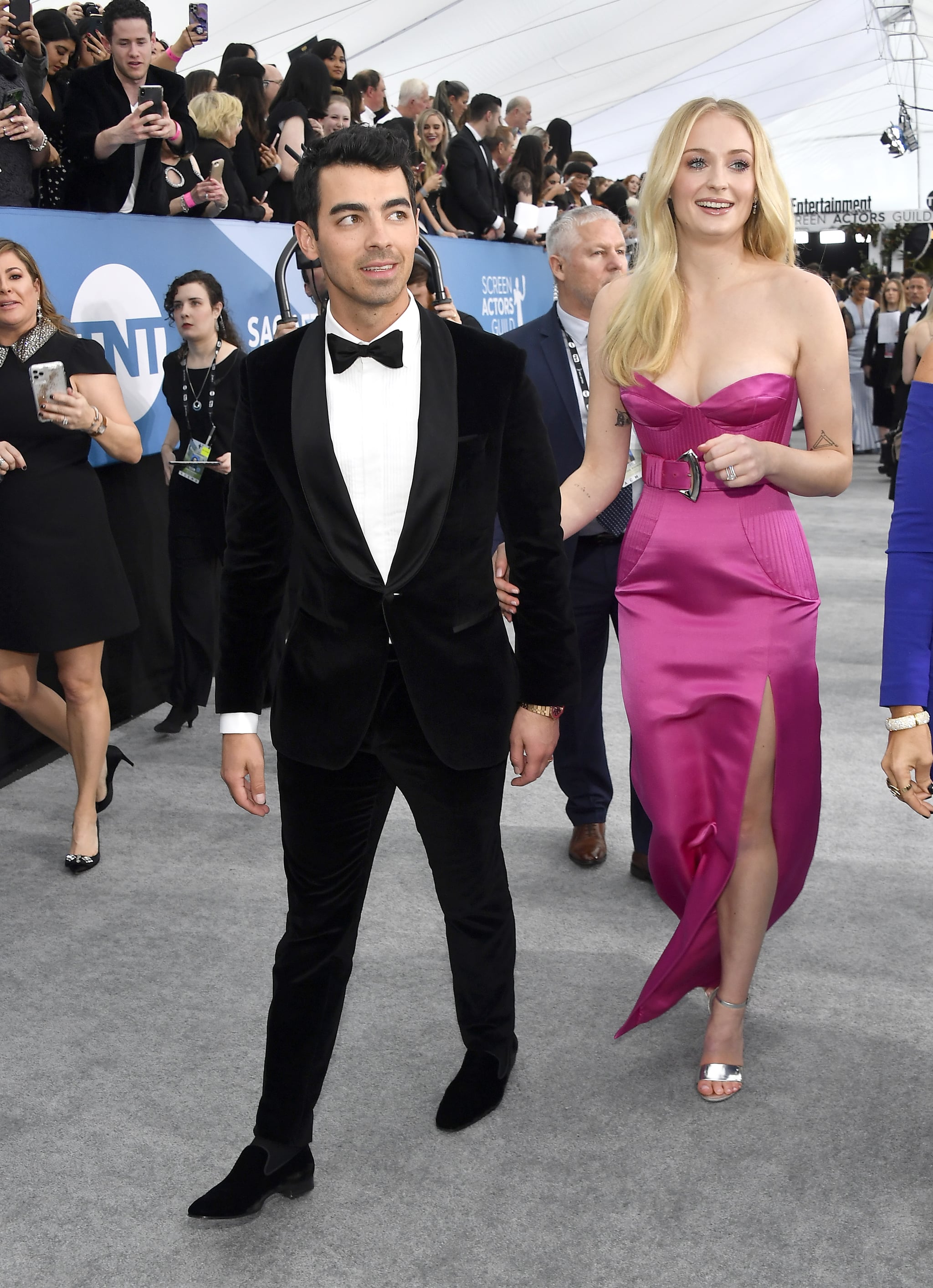 Sophie Turner at Emmys in pink Louis Vuitton as Joe Jonas calls