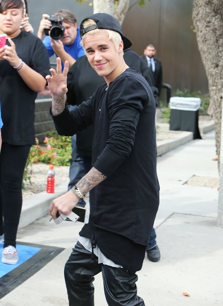 Justin Bieber's freshly dyed blond hair was on display at the grand opening of West Coast Customs in LA on Sunday.
