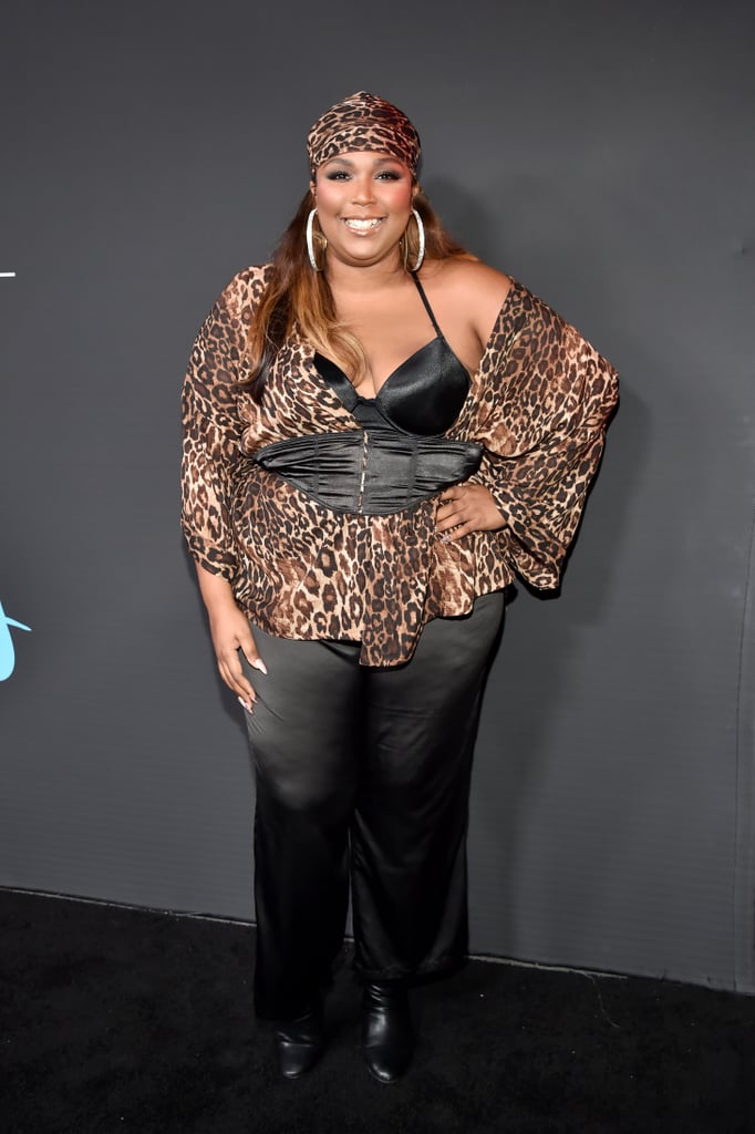 While attending the 2018 GQ x Neiman Marcus All Star Party, Lizzo proved that style is about having more than just a bold pattern — it's about how you wear it. Apart from wearing here corset over blouse, Lizzo wore a matching leopard-print headband that tied the look together perfectly.