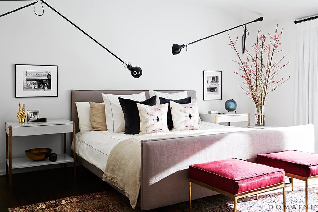 Despite incorporating many different design styles, the home's look feels consistent thanks to a black, white, and mixed metal color palette that runs throughout the space.