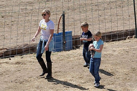 Reese and her children stopped by a pig farm to pick out a Wilbur of their own. Reese and her children stopped by a pig farm to pick out a Wilbur of their own.