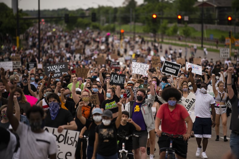 MINNEAPOLIS, MN - MAY 26: Protesters march on Hiawatha Avenue while decrying the killing of George Floyd on May 26, 2020 in Minneapolis, Minnesota. Four Minneapolis police officers have been fired after a video taken by a bystander was posted on social me